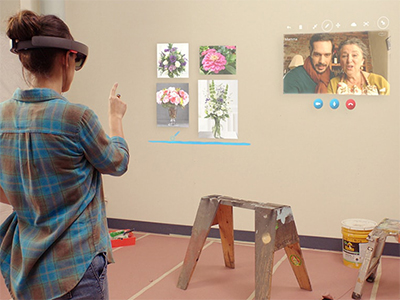 A person wearing a HoloLens using the Skype for HoloLens app.